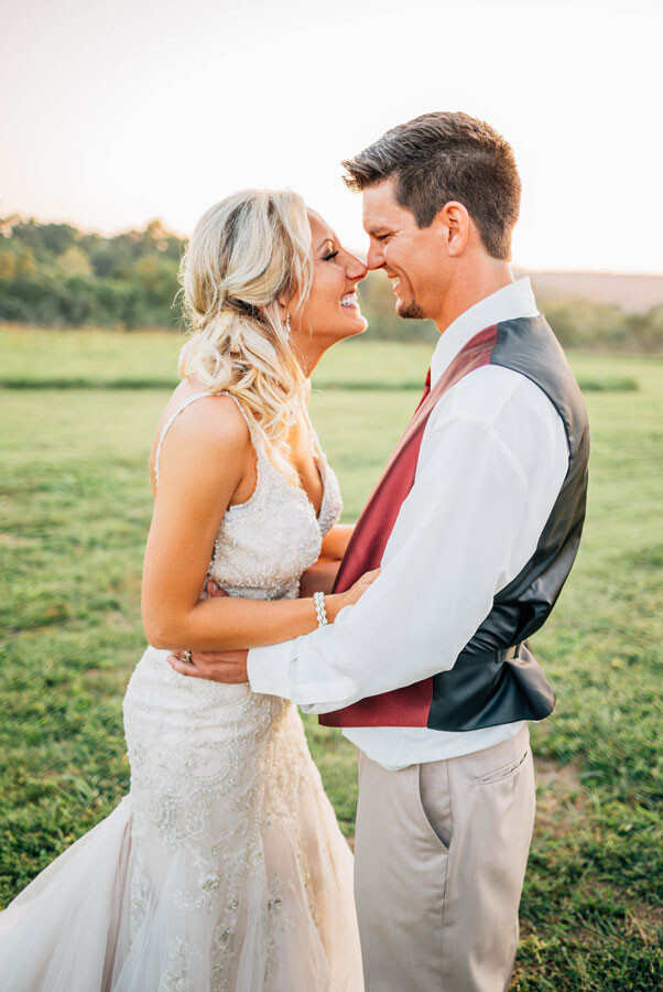 Newlywed couple embrace